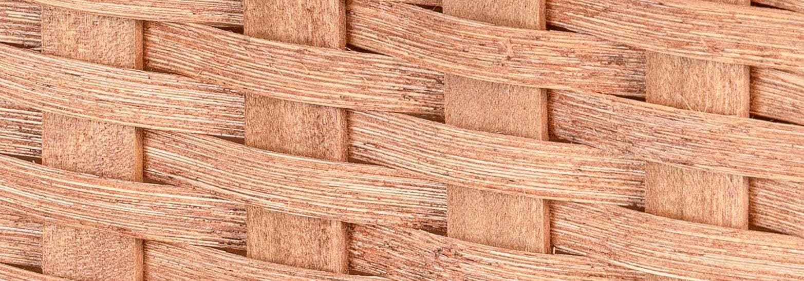 Close-up of handwoven reed and hardwood poplar posts on an Amish basket
